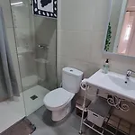 Mi Casita En Con Piscina Comunitaria Y Barbacoa Privada Holiday home